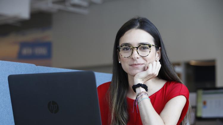 A former Climate Corps fellow working on a computer.